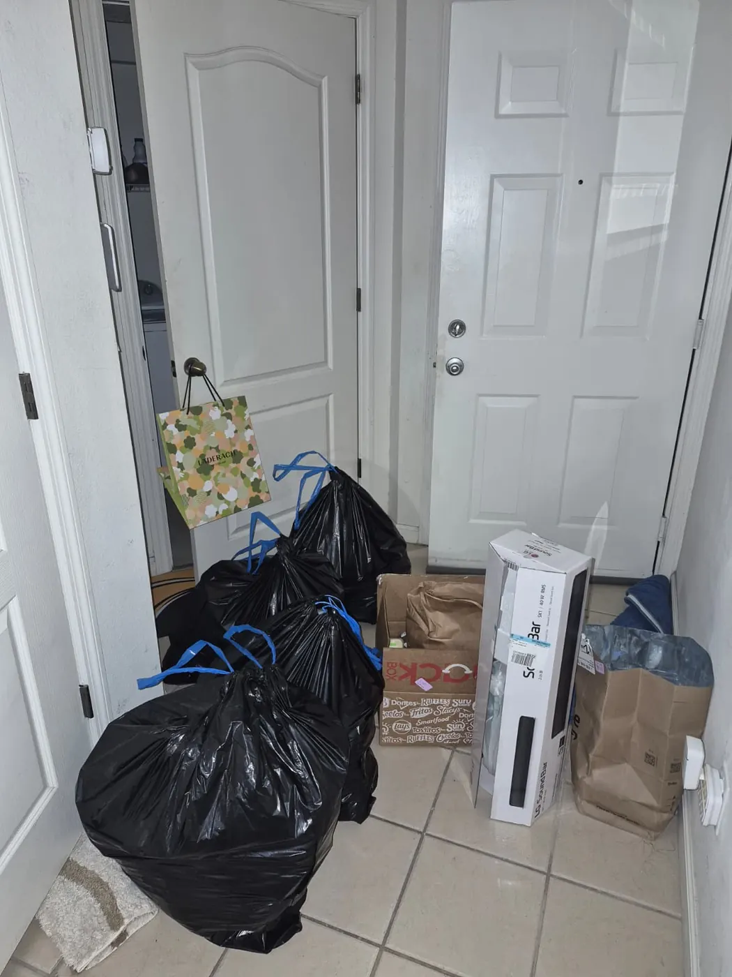 Move-Out Entryway Clear-Out — Before